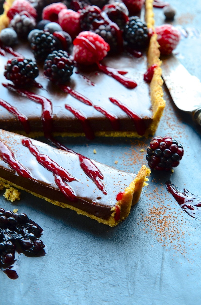 No-bake salted chocolate tart with frosted berries