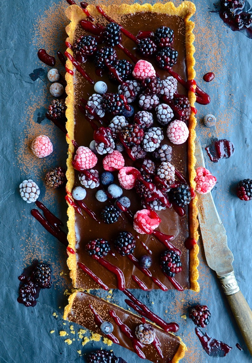 No-bake salted chocolate tart with frosted berries