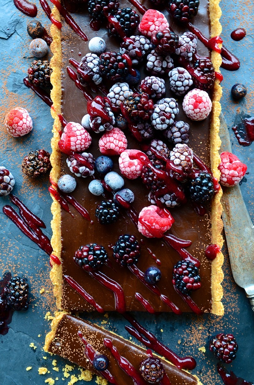 No-bake salted chocolate tart with frosted berries