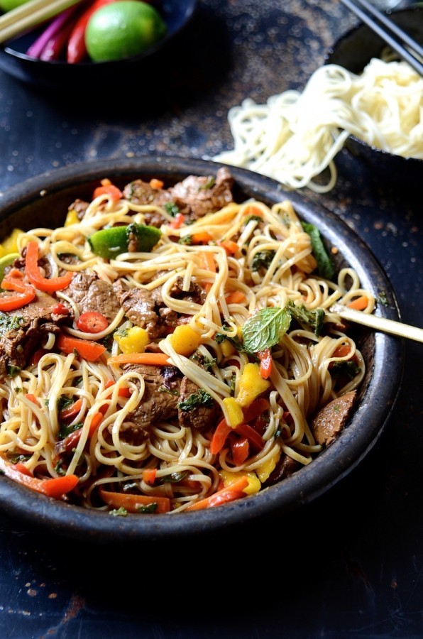 Spicy beef stir fry with sweet peppers and mango