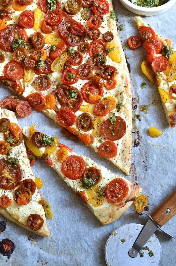 Ricotta and tomato flatbread with sumac and herb oil