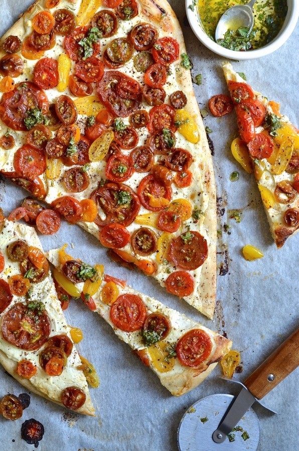 Ricotta and tomato flatbread with sumac and herb oil