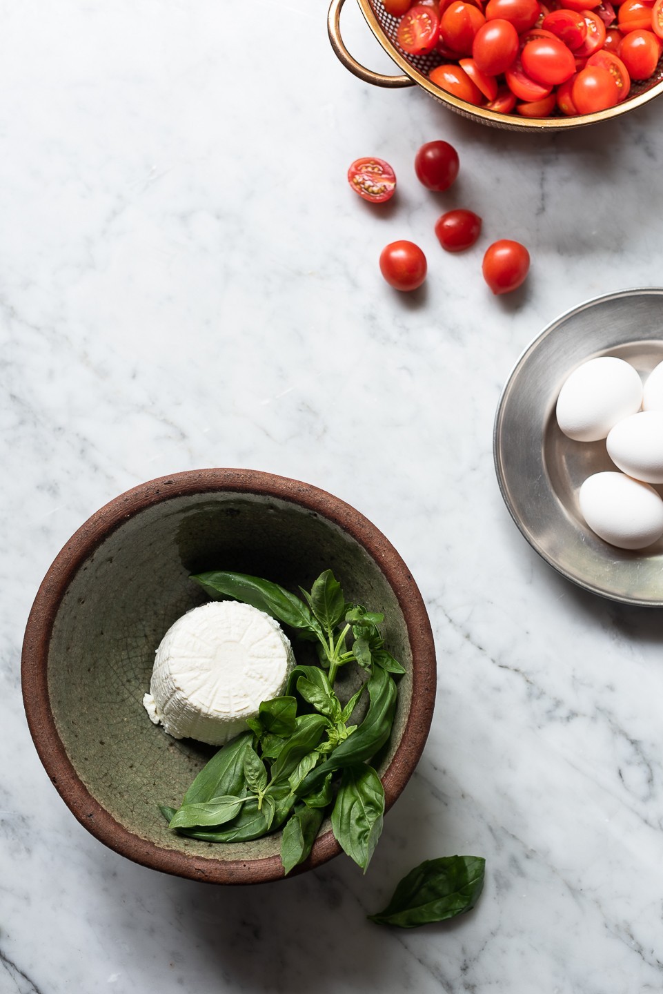 Tomato galette with ricotta and basil oil
