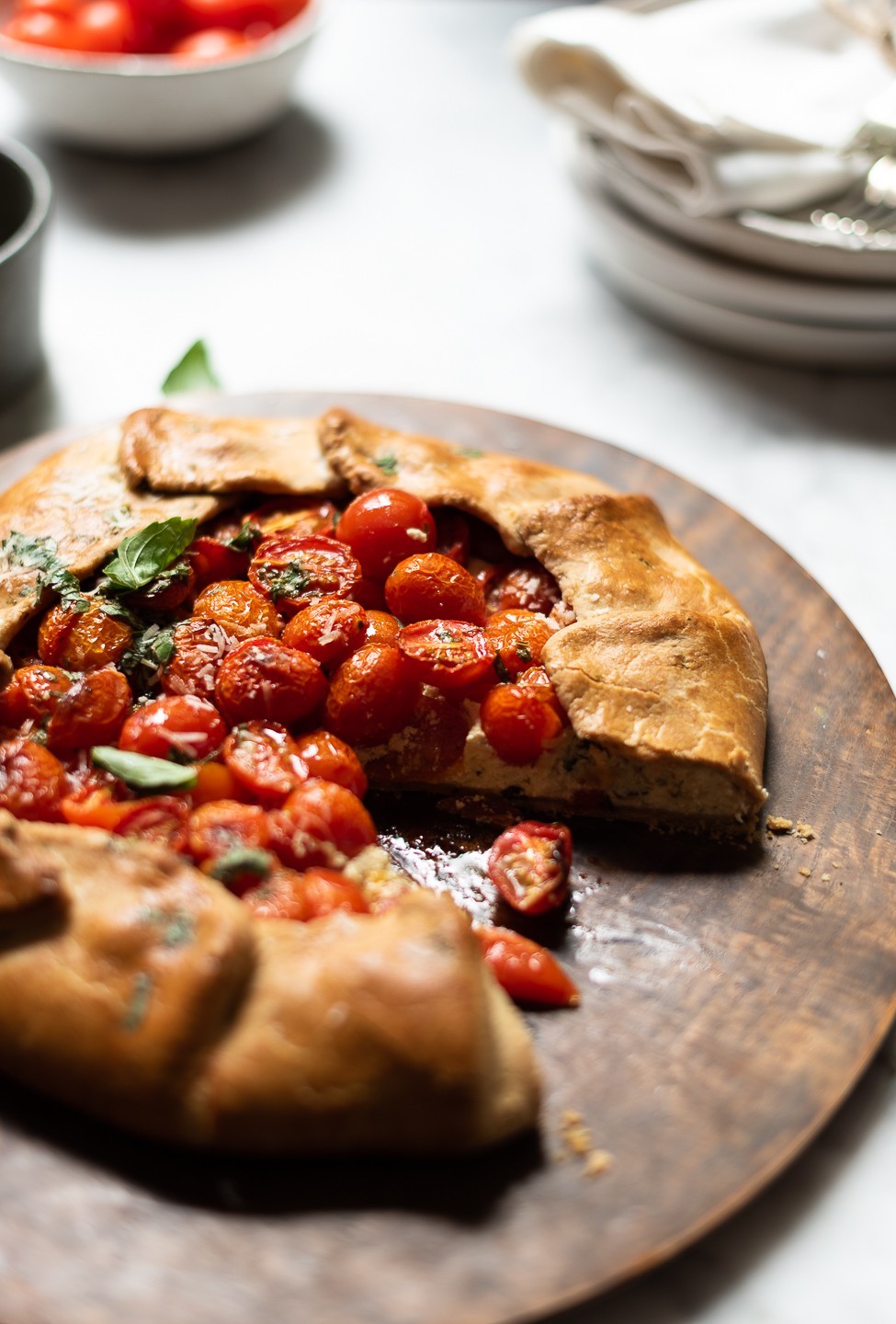 Tomato galette with ricotta and basil oil