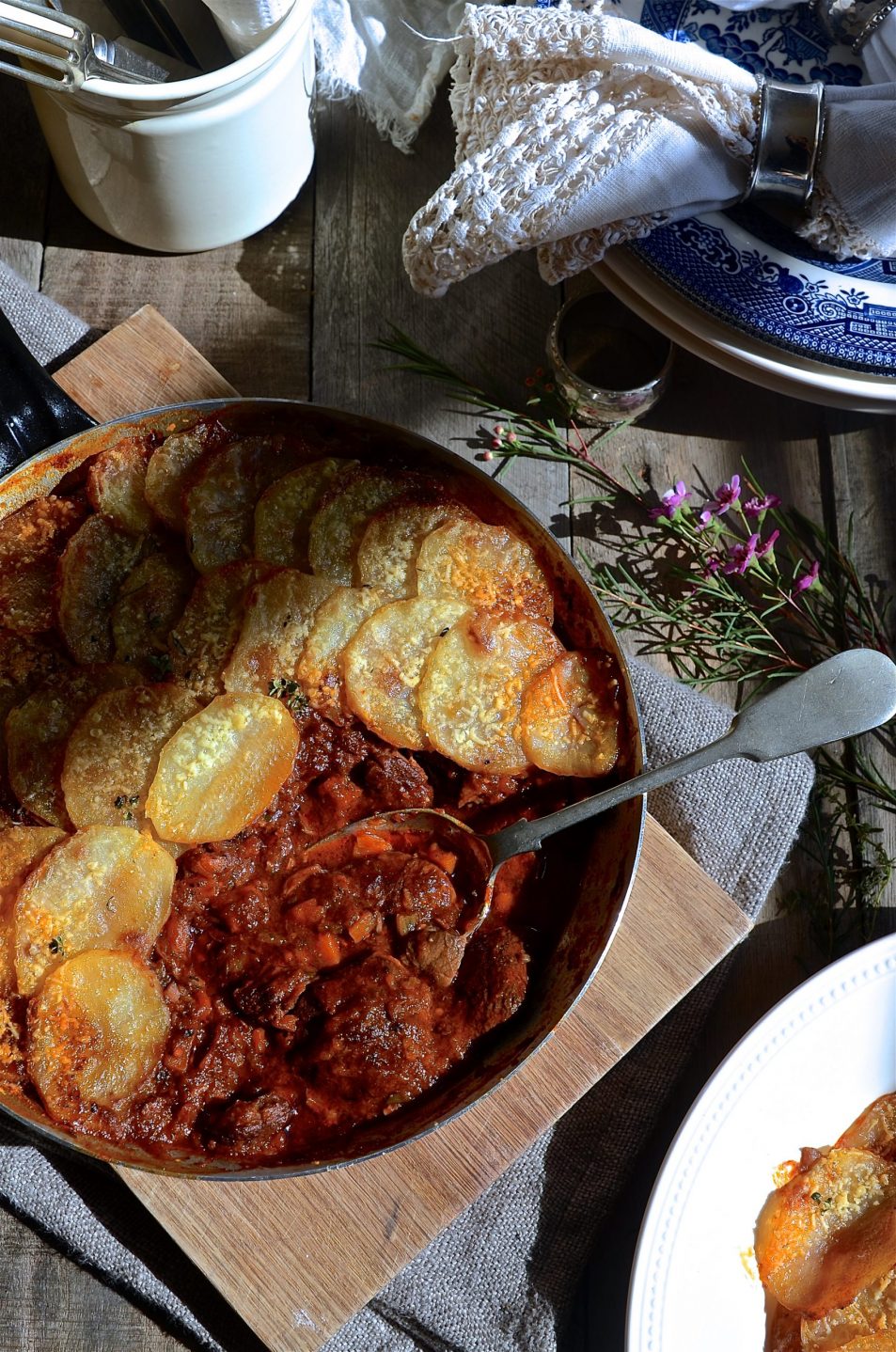Red wine beef stew with potato gratin