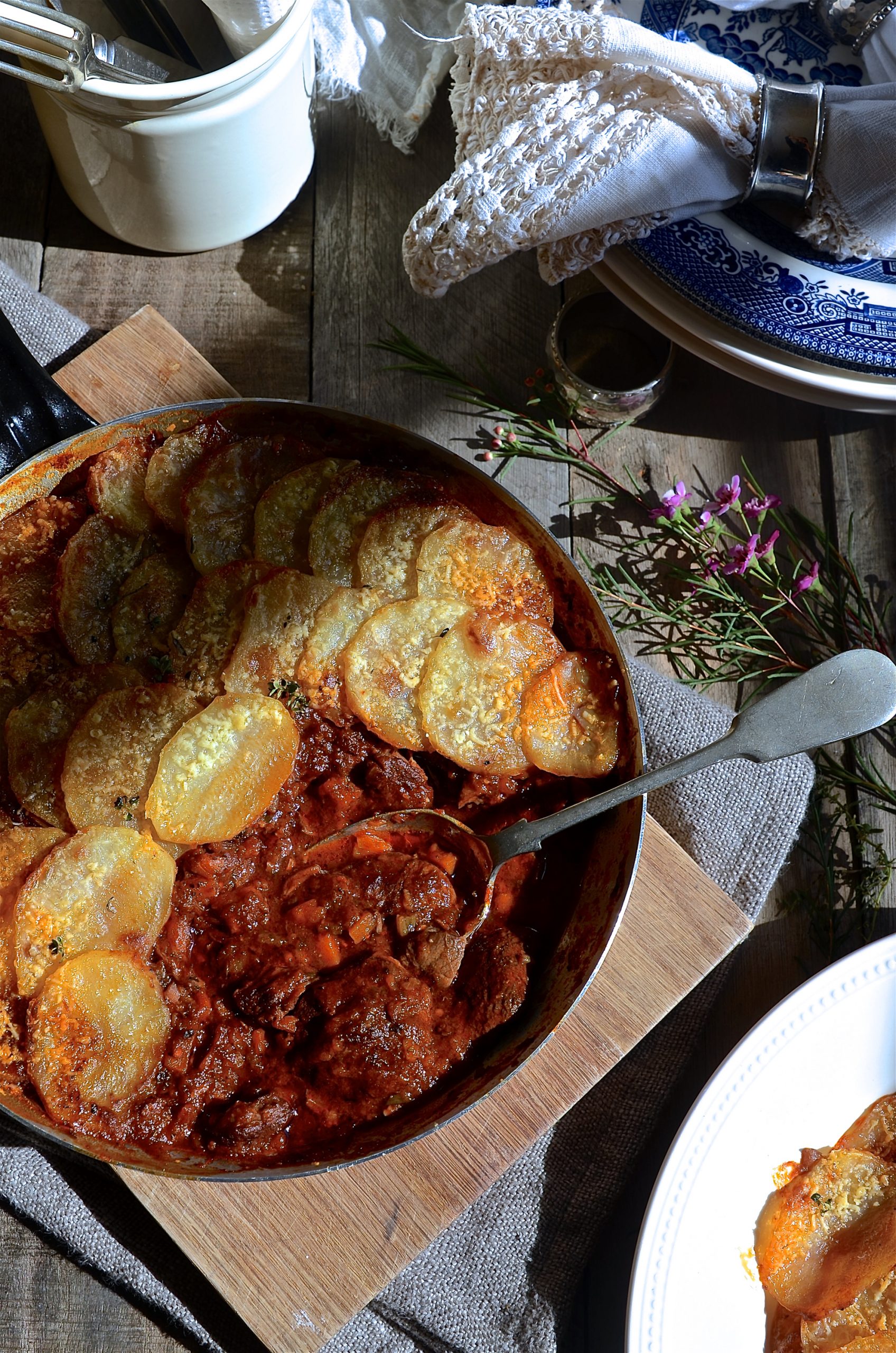 Red wine beef stew with potato gratin