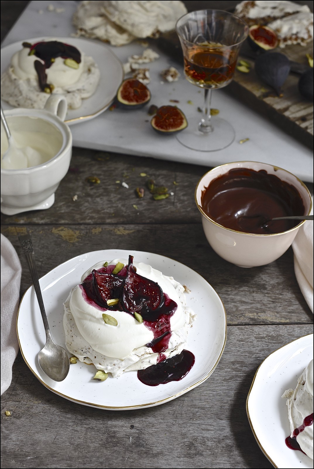 Hot cross bun pavlova with red wine figs