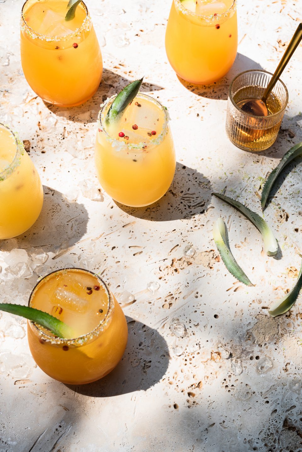 Pineapple Margaritas with Pink Peppercorn Ice